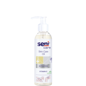 Pump bottle of Seni Care Skin Care Oil with Vitamin E, vegan-certified label