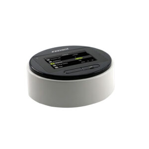 Close-up of a round medical device with a color touchscreen displaying settings like Pressure Unit, Brightness, Language, and Energy Saving