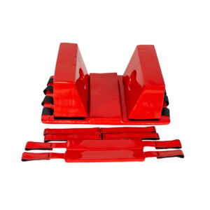 Red fitness balance blocks with attached ankle straps on a white background.