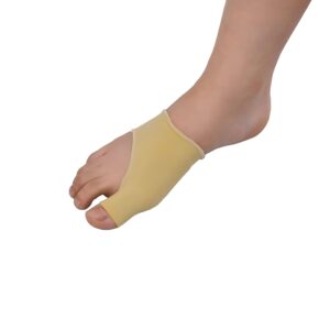 Foot wearing a beige silicone toe protector covering the base of the big toe and adjacent toe