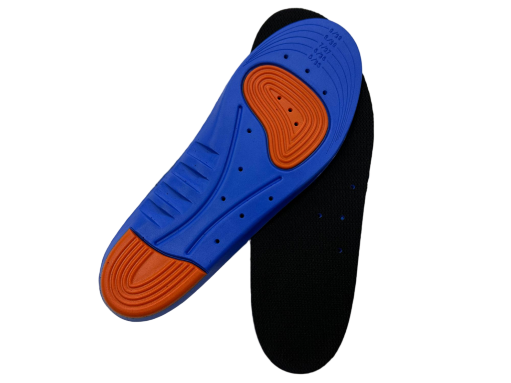 Close-up of a blue sneaker sole with an orange, concentric-grip pad, shown against a black socked foot.
