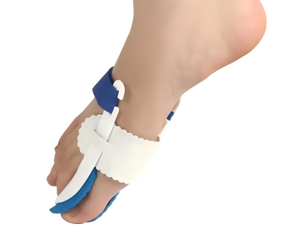 Part of a prosthetic-looking leg with a blue strap and white padding around the ankle area, shown at an angled view.