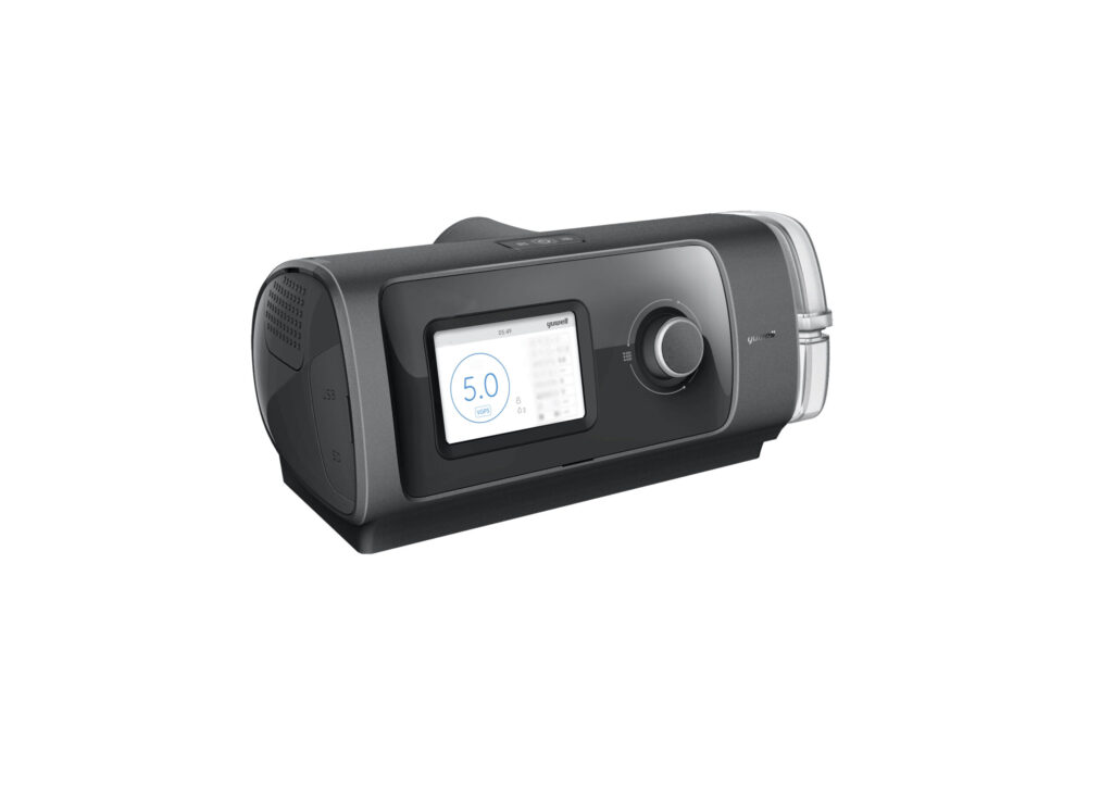 CPAP sleep apnea machine with a digital display showing 5.0 and a circular control knob on the front panel.