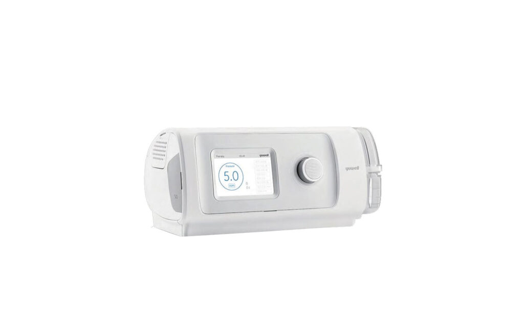 White Yuwell home respiratory device with LCD screen and circular control knob on the front panel.