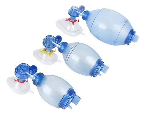 Three blue nebulizer masks with white bases arranged diagonally on a white background.