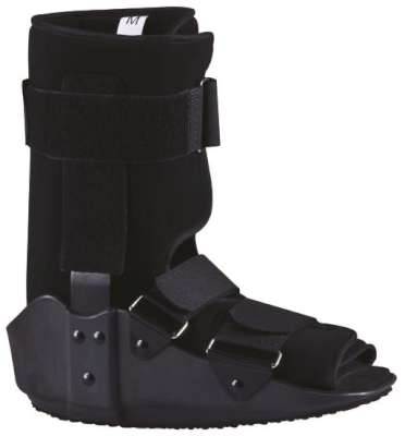 Black medical walking boot with adjustable straps and a rigid sole for ankle immobilization